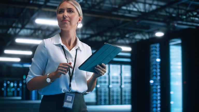 Woman in data farm with tablet